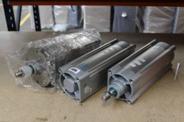 Two Festo Pneumatic Piston Rod Cylinders - 1384811 (DSBC-100-200-PPVA-N3) and one Festo ISO Cylinder