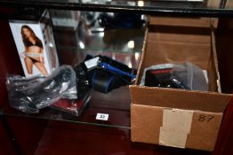 Seven items of assorted as new sex/fetish accessories to include a Jenna Haze Fleshlight, a Trojan