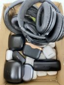 A quantity of assorted pre-owned wireless heaphones and charging cases to include Apple, Bose, Sony