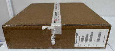 A boxed as new Fortinet FortiWLC-200D Wireless LAN Controller (M/N: FWC-200D P/N: P19429-01-01) (Box