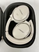 A pre-owned pair of Bose QuietComfort 45 Noise-Canceling Wireless Over-Ear Headphones in White Smoke