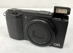 A pre-owned Ricoh GR II 16.2MP Digital Camera with battery (No charger or other items included. Unte