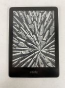 A pre-owned Amazon Kindle Paperwhite 11th Gen E-Reader (M/N: M2L3EK) (Grade B).