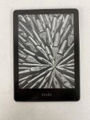 A pre-owned Amazon Kindle Paperwhite 11th Gen E-Reader (M/N: M2L3EK) (Grade B).