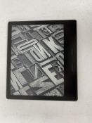 A pre-owned Amazon Kindle Oasis 10th Gen E-Reader (M/N: S8IN4O) (Grade B).