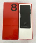 A boxed as new OnePlus 8 (IN2013) 128GB in Onyx Black (Grade A. Box open, UK plug, USB-Cable and cle