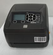 A pre-owned Zebra ZD500 300dpi Thermal Label Printer (P/N:ZD50043-T1E200FZ) (PSU included).