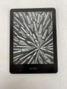 A pre-owned Amazon Kindle Paperwhite 11th Gen E-Reader (M/N: M2L3EK) (Grade B).