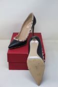A pair of women's pre-owned Valentino Garavani Rockstud Heels in black (EU 41).