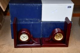 Four thermometer weather clock bookends.