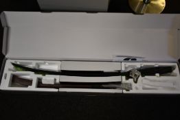 An as new Overwatch Ultimate Genji Replica Sword with stand and sheath.