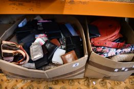 Two boxes of pre-owned purses/wallets/bags.