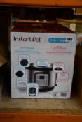 A boxed as new Instant Pot Duo Crips + Air Fryer 11-in-1 Multicooker, UK Plug.