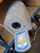 A pre-owned Swimsuit Dryer Company Swimsuit Water Extractor.