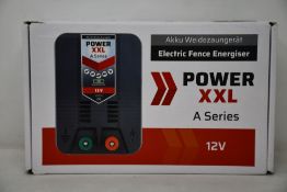A boxed Voss Power XXL A 1000 Series 12V electric fence energiser.