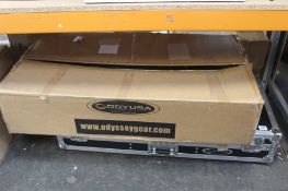 An Odyssey Case Extra Deep DJ Coffin Case for 12? Format DJ Mixer and two Media Players.