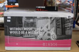 A boxed as new Boss guitar amplifier; Katana 50 MK2 and a boxed as new Boss F5 - 6 dual foot