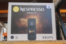 A Krups Nespresso Essenza Mini Coffee Capsule Machine (XN1108.21).