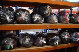 Thirteen bags of pre-owned clothing and related items.