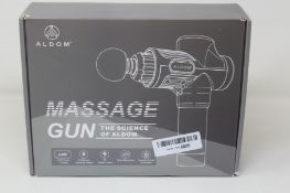 Four Aldom Massage Guns.