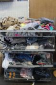 A large quantity of assorted as new clothing and related items (Basket not included).