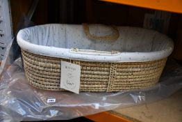 An as new Gloop! Moses Basket With Magic Sky Design.