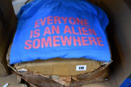 Approximately thirty five 'Everyone Is An Alien Somewhere' Coldplay Tee-shirts in Ibiza Blue (2XL).