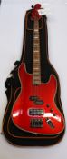 An as new Tribe SF 4 Red Passion Bass Guitar with gig bag.