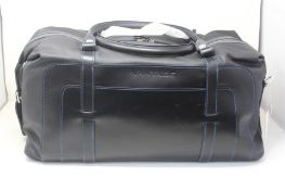 An Aston Martin AM6 Vantage Leather Holdall in black and blue (708402).