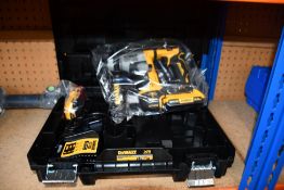 A boxed as new DeWalt XR Brushless DCH172D2-GB 18V XR Brushless 2 x 2.0Ah Cordless Hammer Drill.