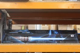 An as new Star Wars The Black Series Leia Organa Force FX Elite Lightsaber.