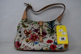 A pre-owned Gucci Multi-colour Floral Print Canvas Shoulder bag.