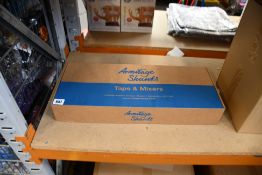 A boxed as new Armitage Shanks Contour 21 Plus Thermostatic Basin Mixer Tap with Copper Tails -