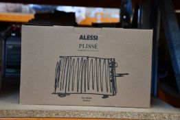 A boxed as new Alessi Plisse Toaster in Grey (UK).