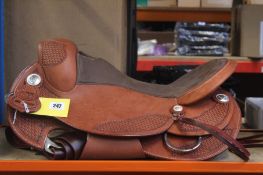 An as new 'The Western Saddler' Brown Leather Saddle, Model and Size Unknown.