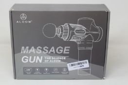 Four Aldom Massage Guns.
