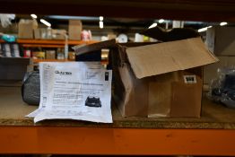 A Qualitrol Rapid Pressure Rise Relay (910-THD-Q-120-STD).