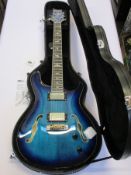 An as new PRS SE Hollowbody II Electric Guitar in Faded Blue Burst with hard case.