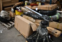 A quantity of automotive and related items to include engines, tyres and gaskets.