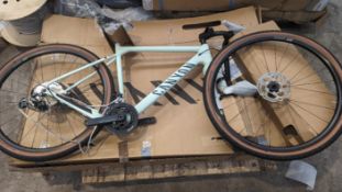 A boxed Canyon Grizl 8 1 by EKAR Endurance bike (Medium Frame).