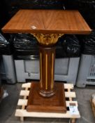 A wooden lecturn (Some wear and tear).