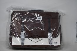 An as new Fossil Evan Messenger Laptop Bag in brown.