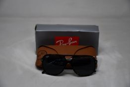 A pair of as new Ray-Ban Sunglasses (No Case).