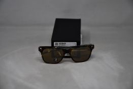 A pair of as new Chimi Titanium Aviator Sunglasses with Blue Lenses.