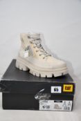 A pair of women's Cat hardwear chunky lace up boots in canvas Neutral (Size UK 6) (Outer box