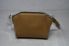An as new Givenchy Antigona Nano crossbody beige cappuccino bag.