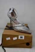 A pair of Kurt Geiger silver synthetic court shoes (40).