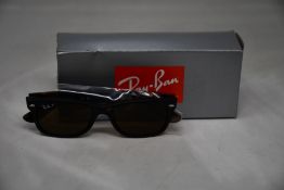 A pair of as new Ray-Ban Havana Sunglasses.