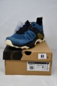 A pair of boxed as new Salomon X Ultra 4 Men trekking shoes in Mallard Blue/Bleached Sand/Bronze