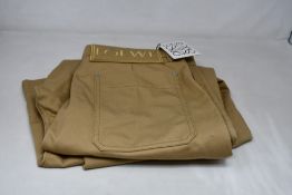 A pair of men's as new Loewe Workwear Trousers in Beige (Size: IT 50).